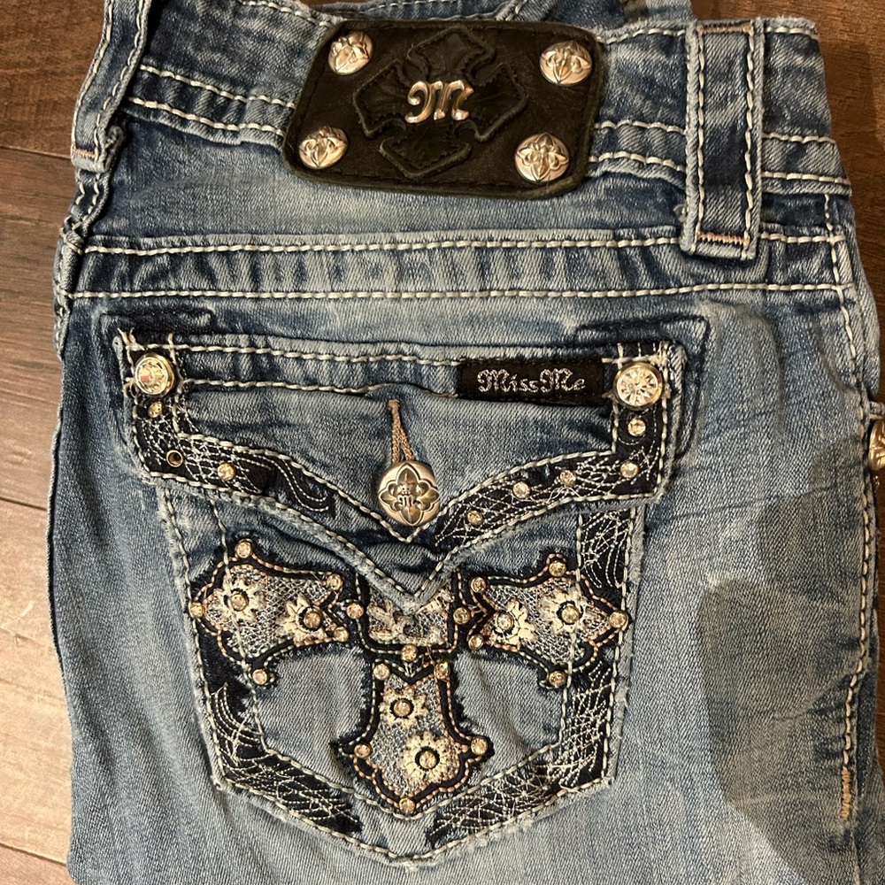 Miss Me Light Wash Bootcut Jeans with Sparkle Cross Accent on Back Pockets